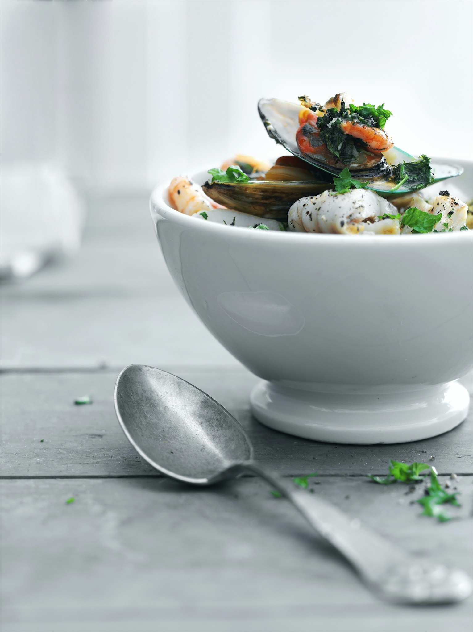 Gratinerad torsk och skaldjur med mandelpotatis