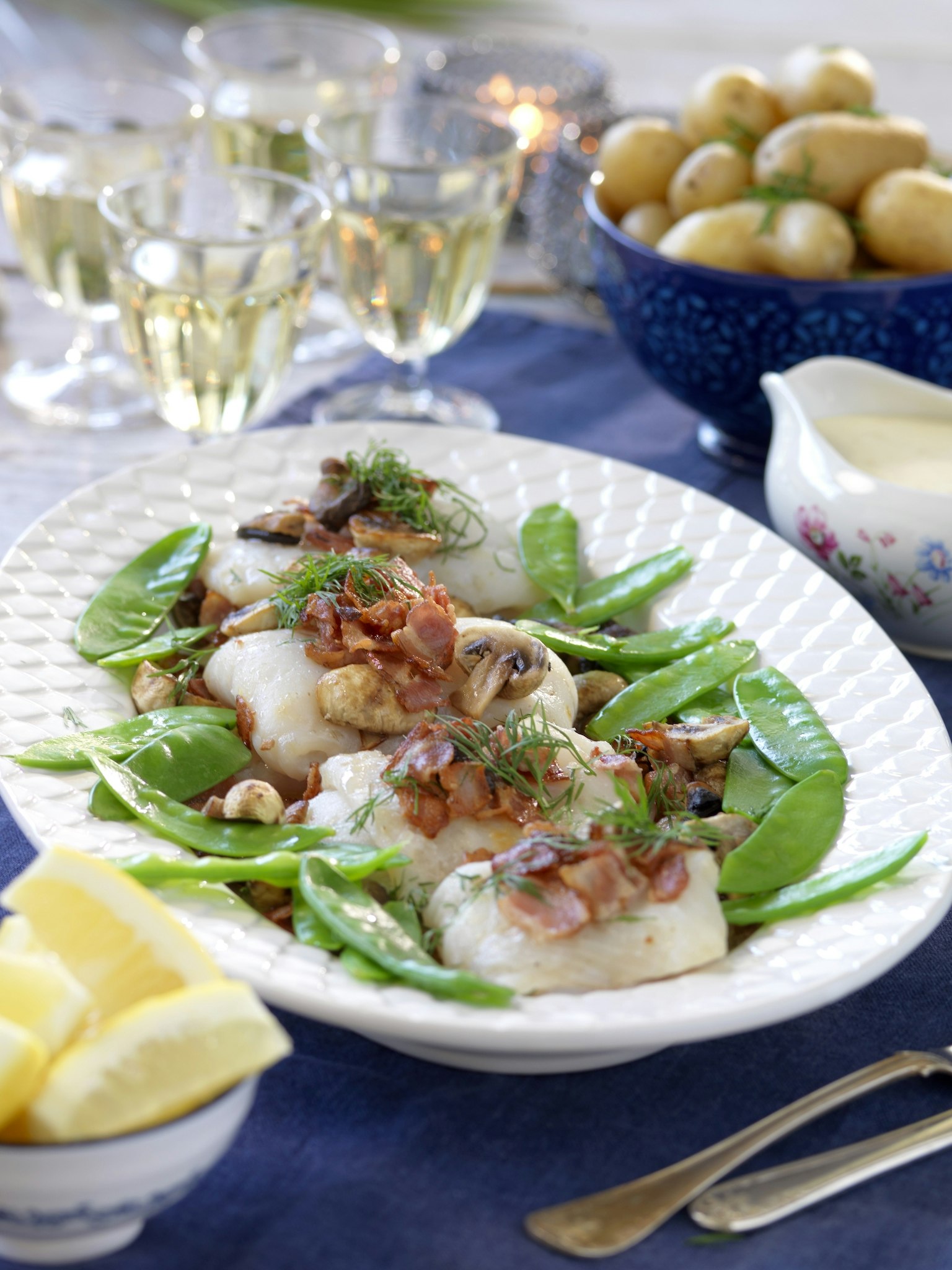 Torsk med bacon, svamp och vitvinssås